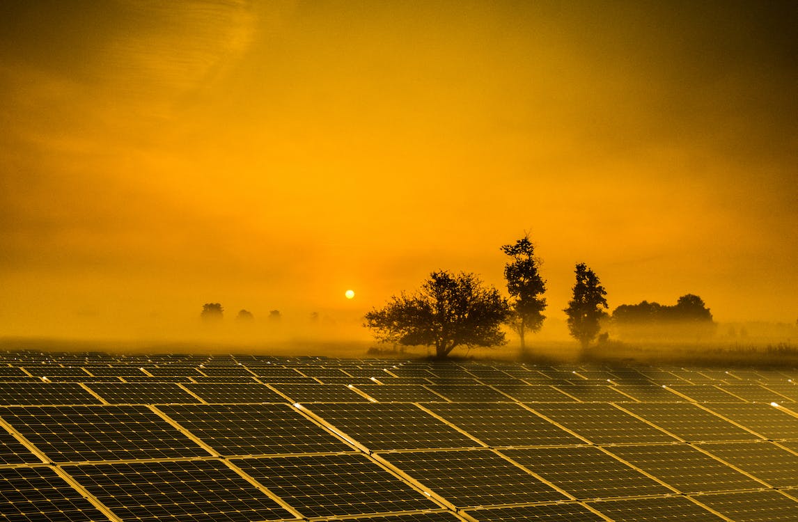 Solar panels at dusk by Magic K, via Pexels.