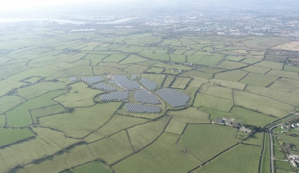 a drone shot of a solar farm