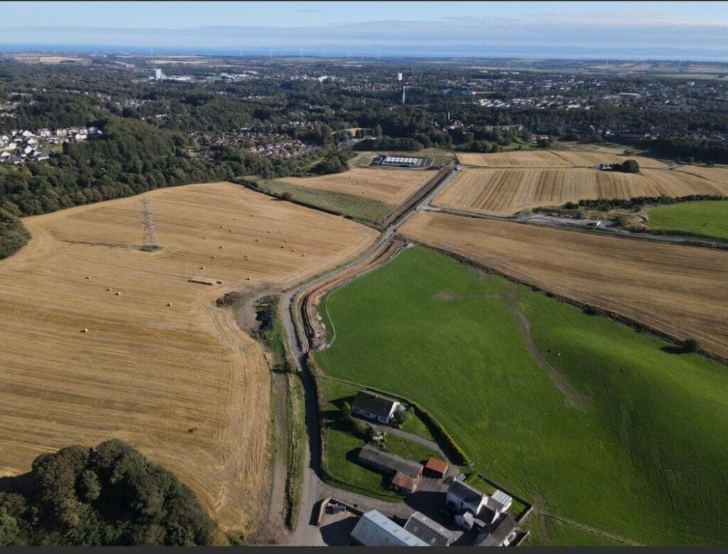 an aerial view of rolling fields