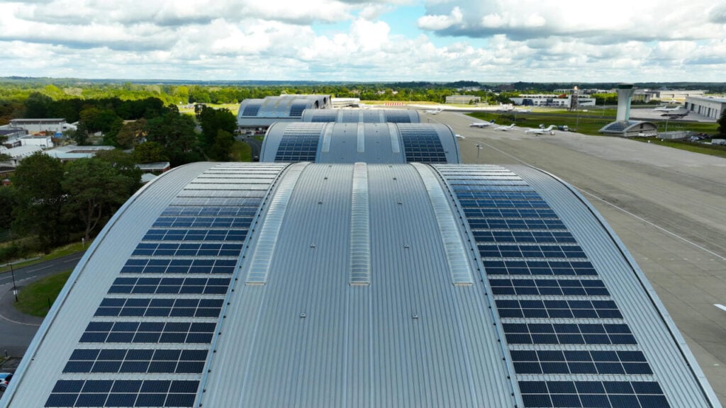 curved solar panels on a building roof