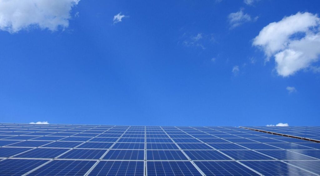 solar panels under a blue sky