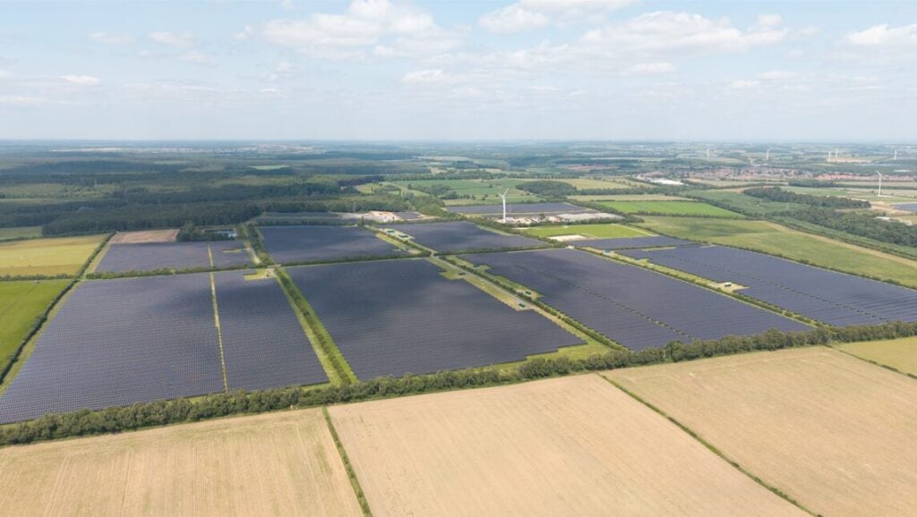 a drone photo of a large solar array