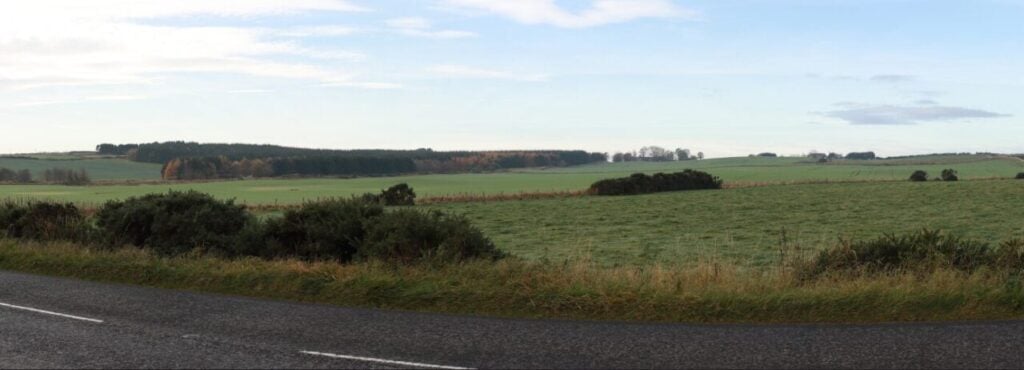 rolling fields under a blue sky