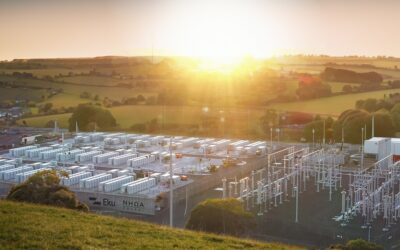 A bright sun shines over a battery storage site using NHOA's battery technology