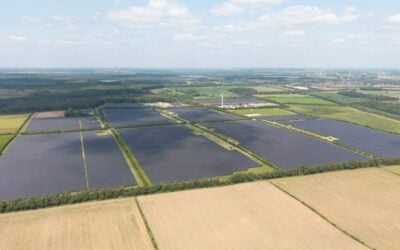 a drone photo of a large solar array