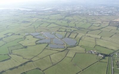 a drone shot of a solar farm