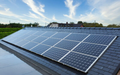 Solar panels on a roof under a blue sky