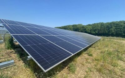 Solar panels outside, close up, under a blue sky