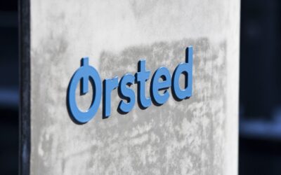 a closeup of the orsted sign, made of concrete