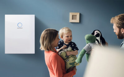 Happy family playing with their son at home